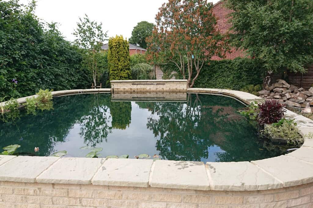 New enlarged koi pond built in the Malverns by Turtle Productions