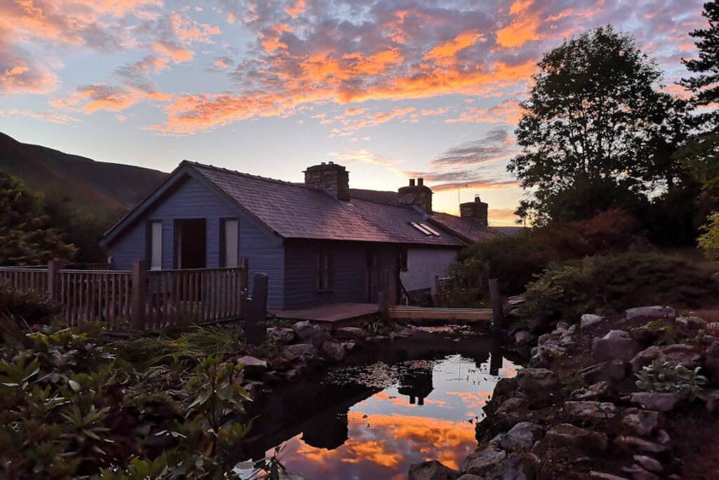 Pond restoration, extension, associated decking and outdoor living in the mountains of mid Wales by Turtle Productions