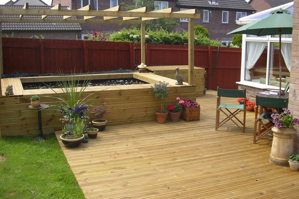 New koi pond and decking in Cheltenham, by Turtle Productions