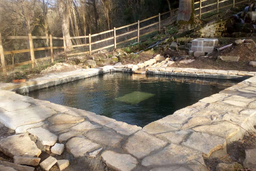 Koi pond renovation in Stroud by Turtle Productions